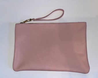 Chic and Stylish: Pink Leather Pouch with Black Cotton Lining and Gold Accents