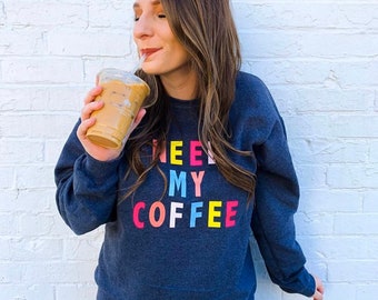 Need My Coffee Graphic Sweatshirt: Colorful Caffeine Lover Tee