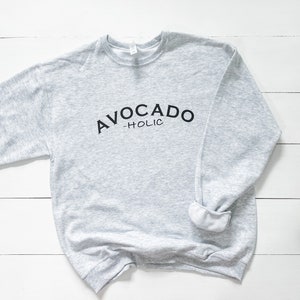Avocado-holic grafisch sweatshirt | guacamole | guac | chips en dipsaus | fijnproever | grappig | dames | fleece