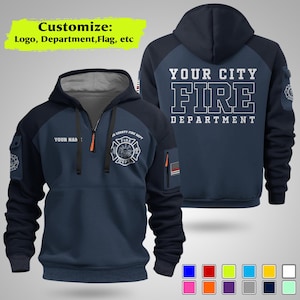 May include: Navy blue and charcoal grey hooded sweatshirt with a zip and the text "YOUR CITY FIRE DEPARTMENT" on the back. The front features a fire department logo and the text "YOUR NAME". The sweatshirt has a customizable design.