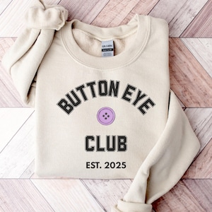 Button Eye Club Sweater – Creepy Cute Graphic Sweatshirt – Dark Whimsical Aesthetic Top – Gothic Coraline Inspired Sweater, image 1