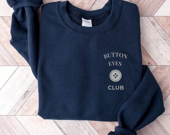 Button Eyes Club Sweater – Creepy Cute Graphic Sweatshirt – Dark Whimsical Aesthetic Top – Gothic Coraline Inspired Sweater,
