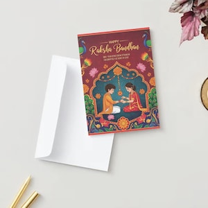 Puede incluir: Una tarjeta de felicitación con el texto "Happy Raksha Bandhan" y una ilustración de dos personas intercambiando regalos. La tarjeta está sobre una superficie blanca junto a un sobre blanco, una vela encendida y hojas decorativas.