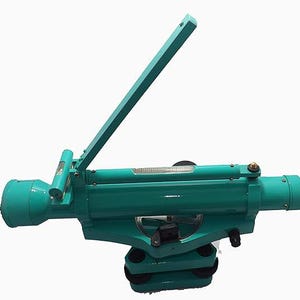 May include: A teal-colored surveying level with a long, adjustable sighting tube and a vertical handle. The instrument has a circular base and multiple adjustment knobs. It is designed for precise measurements in construction or engineering projects.