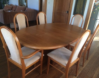 Benny Linden for Ansager mobler mid century teak dining table and 6 chairs. Stamped with manufacturer and that it was made in Denmark.