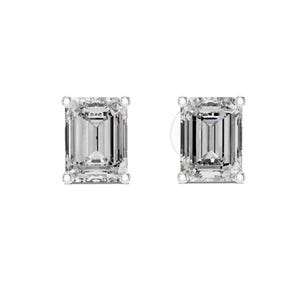 May include: A pair of clear, emerald-cut diamond stud earrings. Each earring has a rectangular gemstone set in a four-prong setting. The earrings are presented against a white backdrop, emphasizing their sparkle and clarity.