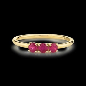 May include: A set of three ceramic mugs with a speckled, matte finish. The mugs are in shades of cream, light gray, and dark gray. Each mug has a simple, minimalist design, perfect for coffee or tea.