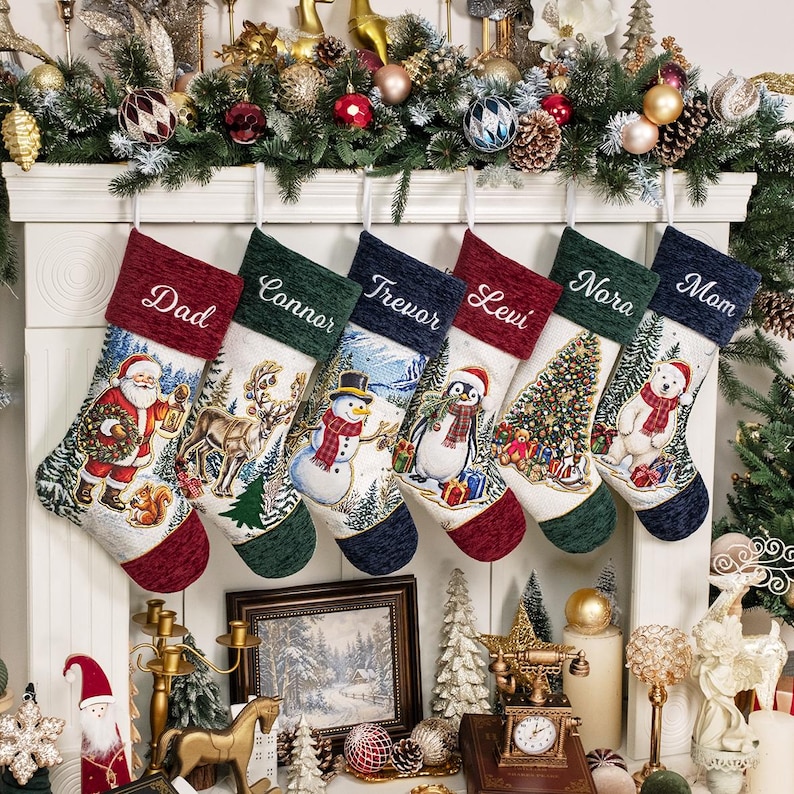 May include: Six personalised Christmas stockings hanging from a white mantelpiece. Each stocking features a unique holiday scene including Santa, a reindeer, a snowman, a penguin, a Christmas tree, and a polar bear, with names embroidered at the top.