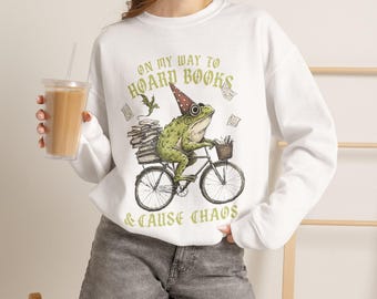 Book Nerd Frog Humor, Hand-Drawn Illustration, Frog on a Bike