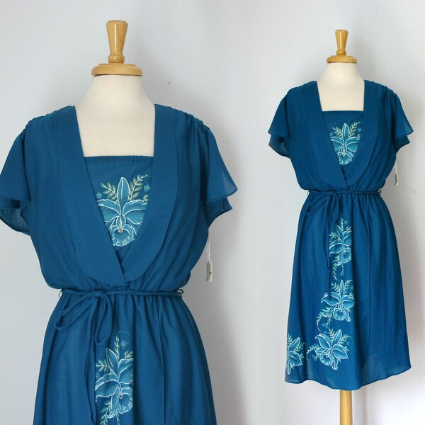 1970s dark cerulean or teal blue flutter sleeve midi mock wrap dress with orchid flower detail, size medium