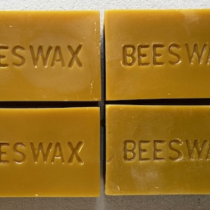 100 % Pure Beeswax , 1 Pound Strained or Unstrained.