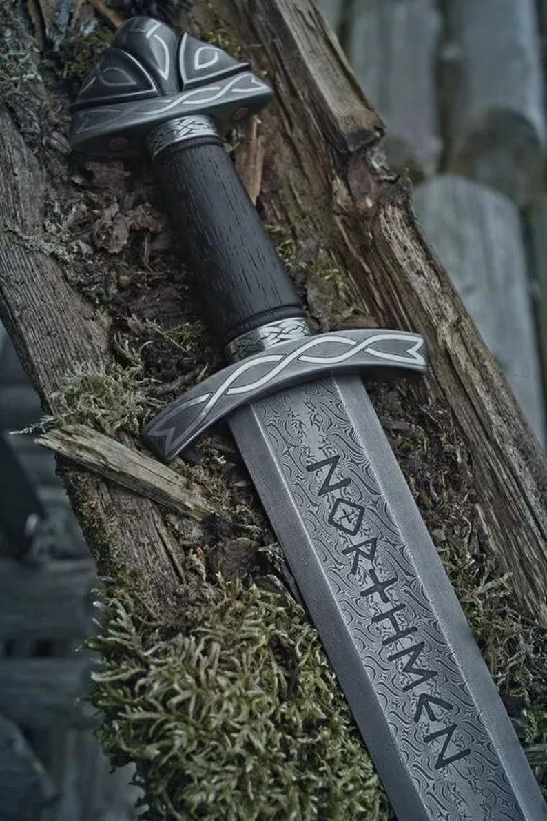 Handmade Viking sword with a Carbon steel blade and full tang design, featuring a detailed wave pattern. Comes with a custom hand-carved leather sheath, perfect for collectors or as a unique gift for men.