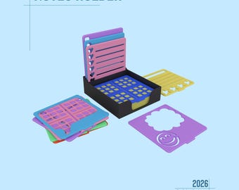 May include: A black notes holder containing a stack of square yellow sticky notes. Several colorful plastic stencils with various cutouts, including hearts, stars, and a smiley face, are arranged around the holder. Text reads NOTES HOLDER.