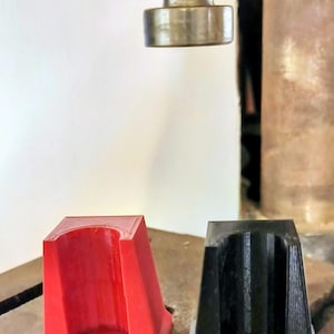 Roll crimp and hull reconditioning holder for shotgun shell reloading.