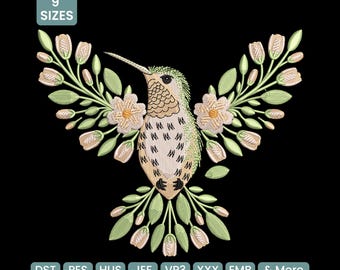 May include: An embroidered hummingbird design with outstretched wings, surrounded by flowers and leaves, in shades of green, beige, and cream. The design is set against a black background. The text "9 SIZES" is in the upper left corner.
