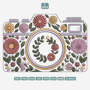 May include: An embroidered design of a camera decorated with colorful flowers and leaves. The camera lens is surrounded by a wreath of leaves. The design includes the text "9 SIZES" and file type abbreviations.