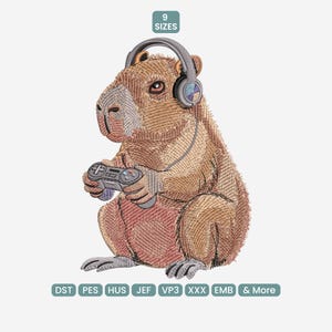 May include: An embroidered design featuring a capybara wearing headphones and playing a video game. The capybara is depicted in shades of brown and tan, with a pinkish-red belly. The image includes the text "9 SIZES" and embroidery file formats.