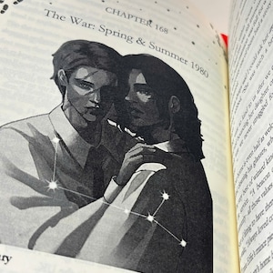 May include: A black and white illustration of two people embracing, with a constellation design overlay. The text "The War: Spring & Summer 1980" is visible. The book is open, with text on the adjacent page.