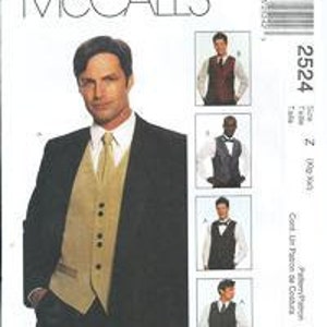 May include: A McCall's sewing pattern envelope featuring a man in a black suit with a tan vest and tie. The envelope includes images of different vest styles and the number 2524.