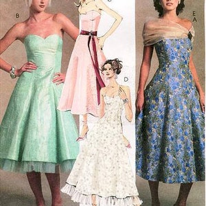 May include: Three strapless dresses, one in light green, one in pink, and one in blue with a floral pattern. The dresses are all knee-length and have a fitted bodice and a full skirt.
