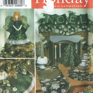 May include: A Simplicity Holiday pattern collection featuring a green and white Christmas tree topper, a green and white table runner, and a green and white Christmas tree skirt. The pattern includes instructions for making a Christmas tree topper, a table runner, and a Christmas tree skirt. The pattern is titled "Holiday" and features the word "NOEL" in green and white.