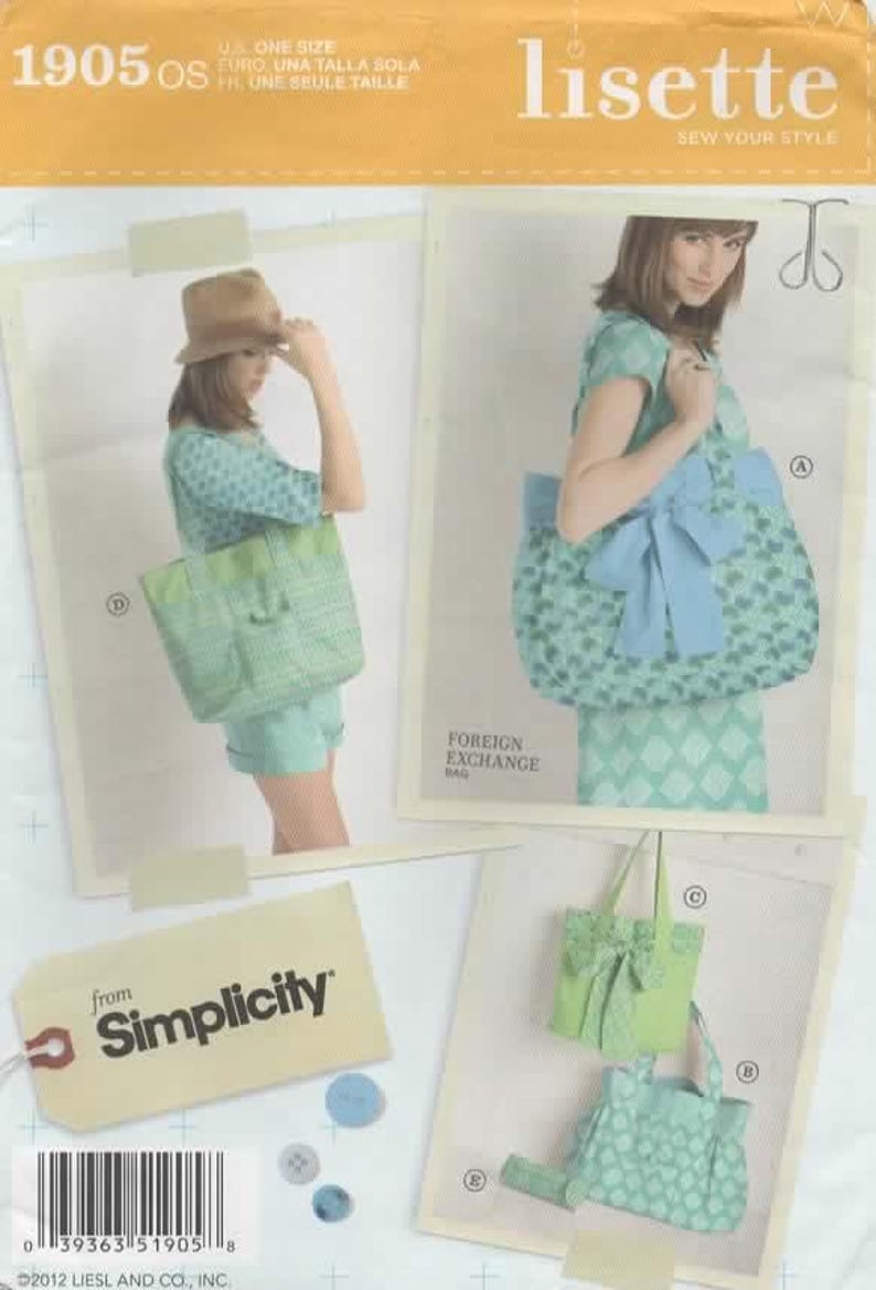 May include: A Simplicity sewing pattern with a Lisette design. The pattern shows a tote bag and a handbag in a light green and blue diamond pattern. The text "FOREIGN EXCHANGE BAG" is visible.