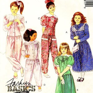 May include: McCall's sewing pattern for children's clothing. The image shows illustrations of various outfits, including dresses and pajamas. The outfits are in pink, blue, and green. The text "Fashion Basics for Kids" is visible.