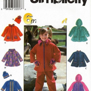 May include: Simplicity sewing pattern number 8297 for a child's jacket and pants. The pattern includes six different styles, including a hooded jacket, a zip-up jacket, and a pair of pants. The pattern is for sizes AA 1/2, 1, and 2.