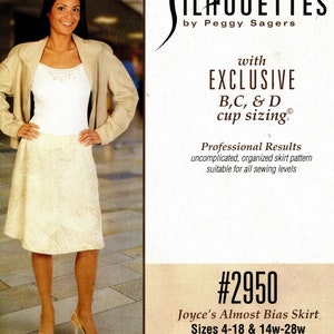 May include: A woman wearing a white tank top and a beige skirt with a leaf pattern. The skirt is a bias cut and is part of a sewing pattern called Joyce's Almost Bias Skirt. The pattern is available in sizes 4-18 and 14w-28w. The pattern is by Silhouettes by Peggy Sagers.