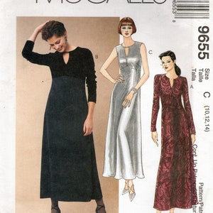 May include: A sewing pattern for three different dresses. The pattern is for sizes 10, 12, and 14. The dresses are all long and have a V-neckline. The first dress is black, the second is silver, and the third is red with a floral pattern. The pattern is called "Easy McCall's 9655".