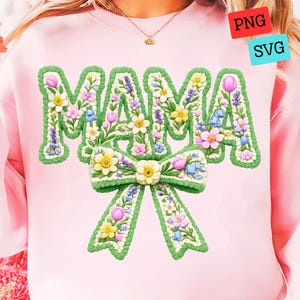 May include: Pink sweatshirt with the word "MAMA" in green, floral-filled letters. A green bow with floral accents is below the word. The design includes yellow, pink, and blue flowers. The image also includes "PNG" and "SVG" tags.