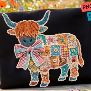 May include: A black fabric surface featuring a patchwork highland cow design. The cow is composed of various floral and checkered fabric squares with frayed edges, accented by colourful buttons and a large plaid bow around its neck.