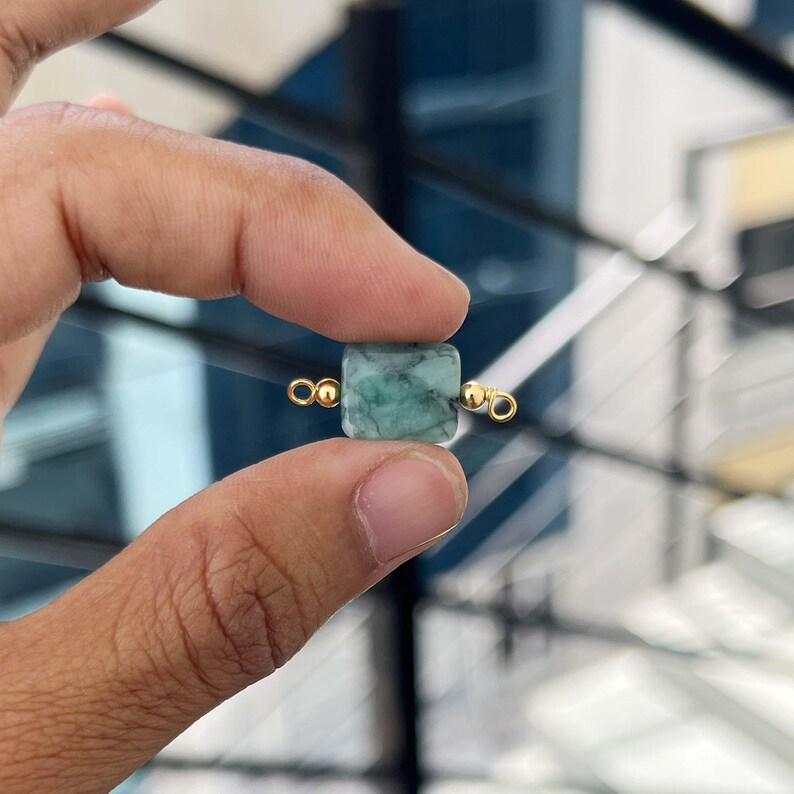 Emerald rectangular gemstone connector bead with gold plated loops, natural stone jewelry making charm
Natural green stone connector with gold plated findings, rectangle gemstone bead for jewelry making
Green marble gemstone rectangle charm with gold loops, DIY jewelry supply
Rectangular green gemstone bead connector, gold plated ends, handmade jewelry component
Natural green crystal connector bead with gold loops, small rectangle charm