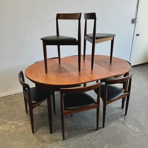 Hans Olsen Frem Rojle Teak Dining Set: Expanding Table & 8 Nesting Chairs
