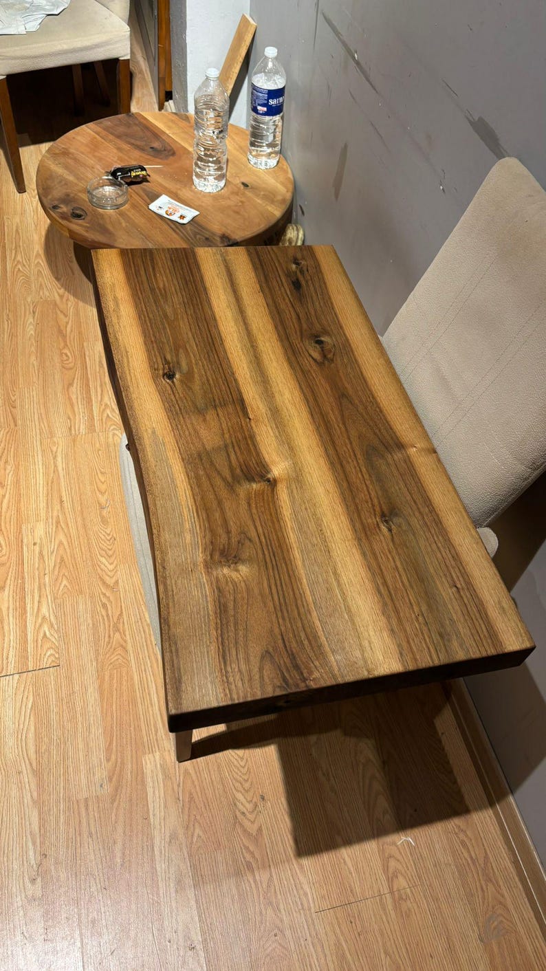 Custom size floating vanity shelf installed in spa-inspired bathroom.