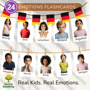 May include: A set of 24 emotion flashcards featuring photos of children expressing various feelings. The cards are strung on a line with German flag decorations. Text includes "Emotions Flashcards" and "Real Kids. Real Emotions."