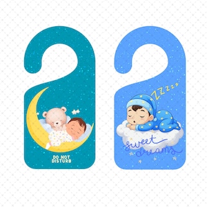 May include: Two blue door hangers. One features a crescent moon with a sleeping baby and a teddy bear. The other shows a baby sleeping on a cloud with the words "sweet dreams". Both have a glittery background.