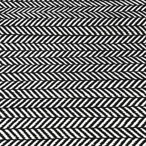 May include: A textile fabric featuring a high-contrast black and white herringbone pattern. The design consists of repeating V-shaped columns of woven threads that create a consistent, geometric zigzag texture across the entire surface area.