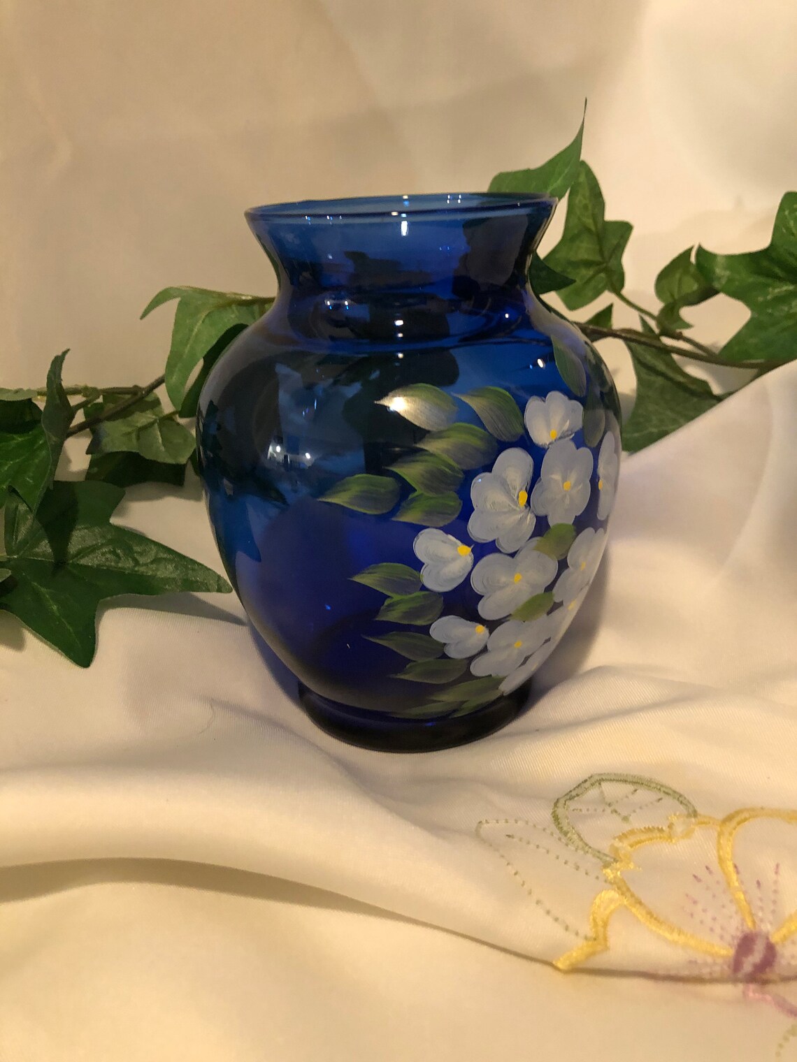 Cobalt blue vase with light blue/white flowers hand painted on Etsy