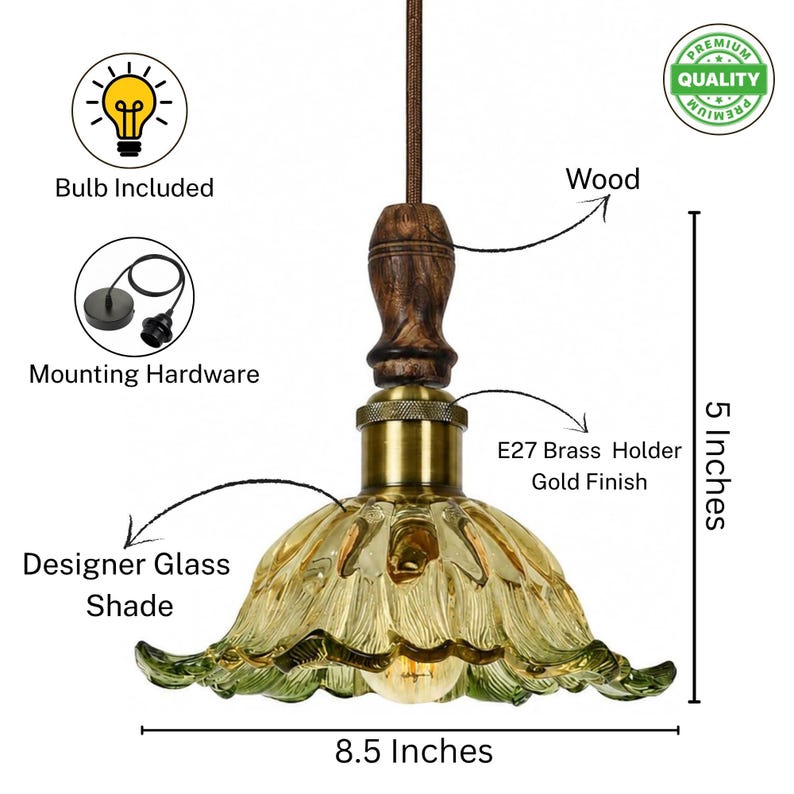 May include: A pendant light featuring a scalloped, amber-tinted glass shade, a brass E27 holder, and a dark wood accent piece. The fixture includes mounting hardware and a bulb. Dimensions are 5 inches in height and 8.5 inches in width.