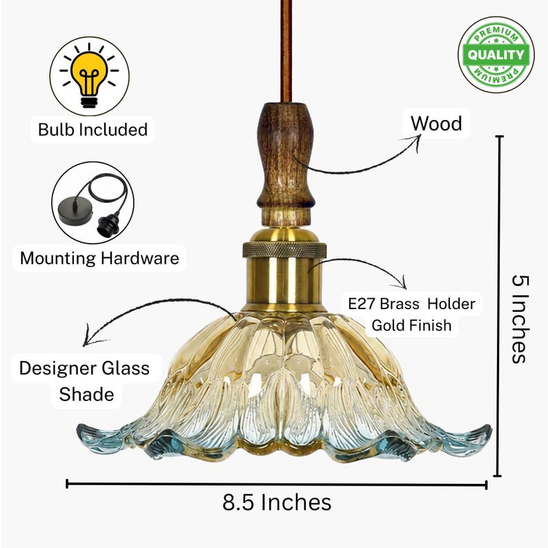 May include: A pendant light featuring a scalloped designer glass shade with amber and blue tones, a gold finish E27 brass holder, and a wood accent piece. The fixture measures 5 inches in height and 8.5 inches in width, including mounting hardware.