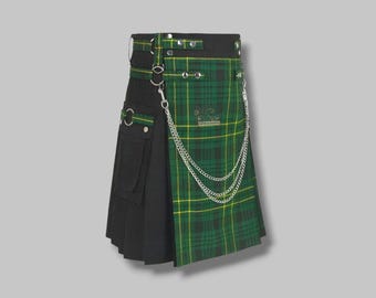 Może przedstawiać: Kilt z czarną plisowaną częścią i zielono-żółtym wzorem w kratę. Posiada czarny pas z srebrnymi detalami, srebrny łańcuch i małą kieszeń. Tradycyjny element garderoby.