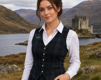 May include: A woman wearing a dark green and blue plaid vest with silver buttons over a white collared shirt. The vest is paired with a matching plaid skirt. A small emblem is on the vest. The background features a lake, mountains, and a castle.