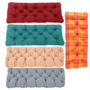 May include: A selection of button-tufted cushions in different colours. The cushions include solid colours such as red, teal, peach, and grey, alongside a plaid orange and yellow cushion. The cushions are rectangular and have a button-tufted design.