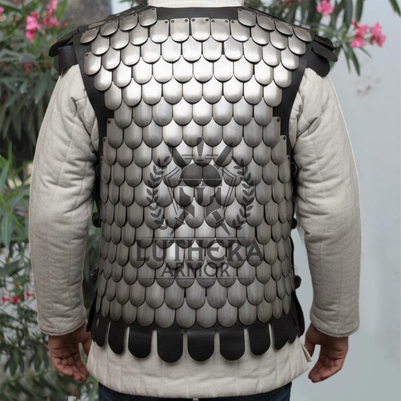 Adjustable straps on medieval scale armor back view
