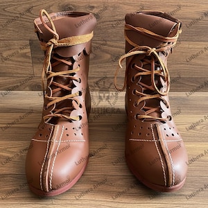 Front view of handmade Roman leather boots showing lace-up design and authentic historical detailing