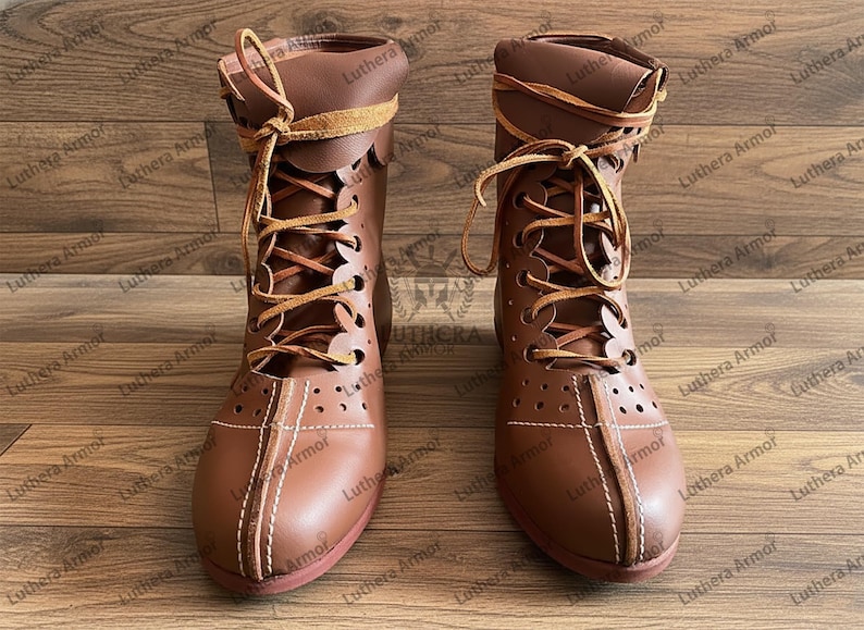 Front view of handmade Roman leather boots showing lace-up design and authentic historical detailing