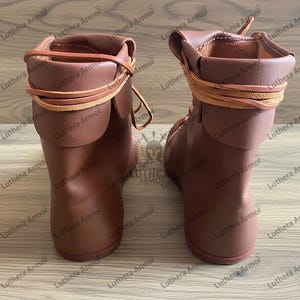 Side view of Roman leather boots inspired by Vindolanda archaeological finds, brown historical reenactment shoes