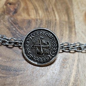 Vintage crossed rifle silver metal button on cable chain