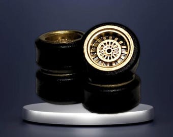 Ruedas personalizadas a escala 1/64, llantas y ejes detallados.